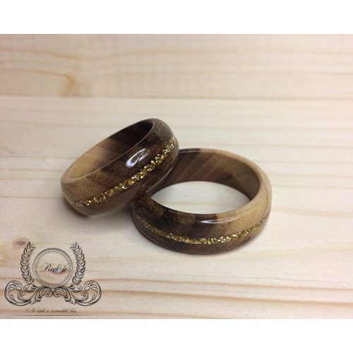 Wooden ring with golden inlay